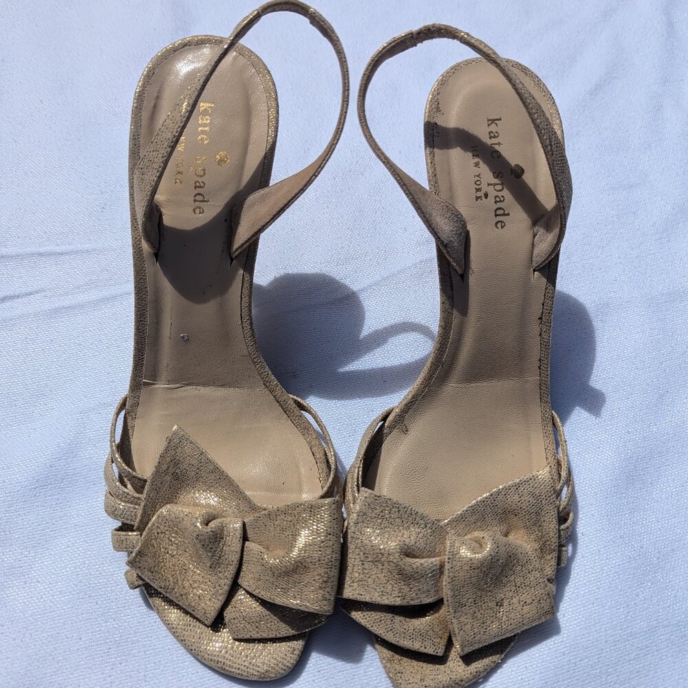 Kate Spade glittery gold bow heels